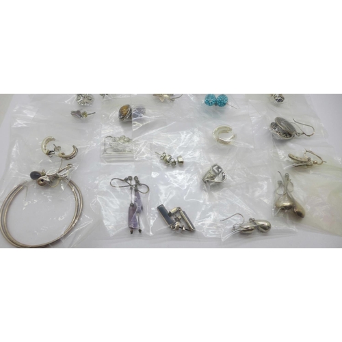 977 - Twenty-five pairs of silver earrings