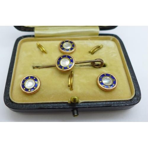 978 - A blue enamel and pearl brooch and three button set, cased