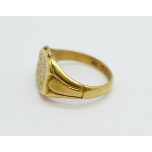 979 - An 18ct gold ring, Birmingham 1923, with initials, 9.4g, S