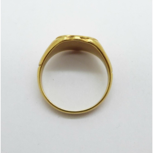 979 - An 18ct gold ring, Birmingham 1923, with initials, 9.4g, S