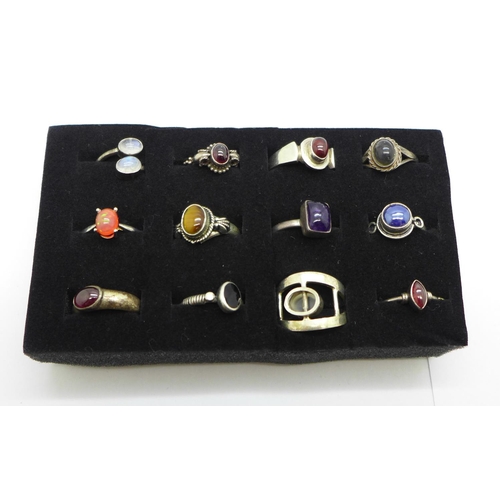 984 - Twelve silver stone set rings