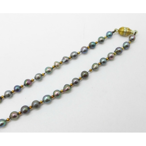 996 - A cultured pearl necklace, clasp marked 750