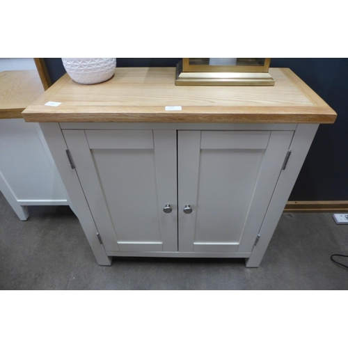 1426 - A Hampshire painted oak two door mini sideboard -damage to rear right leg* this lot is subject to VA... 