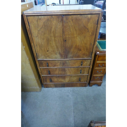 101 - An Art Deco walnut tallboy