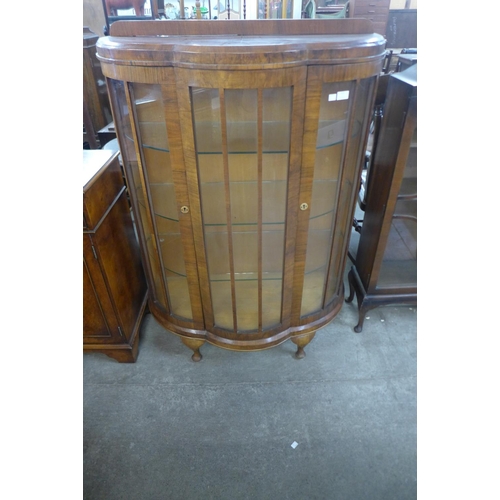 113 - A walnut two door display cabinet