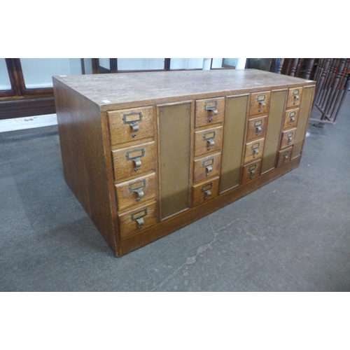 120 - An oak double sided index drawer cabinet