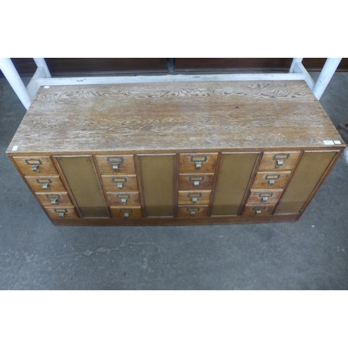 120 - An oak double sided index drawer cabinet