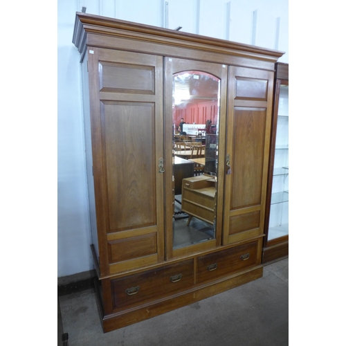 124 - An Edward VII walnut wardrobe