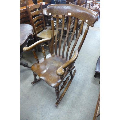 135 - An elm farmhouse rocking chair