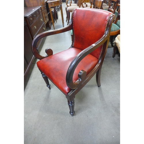 143 - A Regency mahogany and red leather library chair