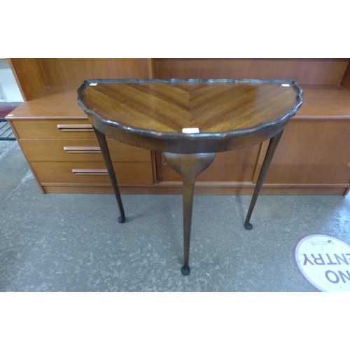 158 - A mahogany demi lune hall table