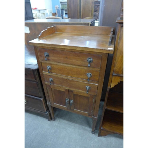 163 - An Edward VII mahogany music cabinet