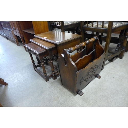 166 - An oak nest of tables and a newspaper stand