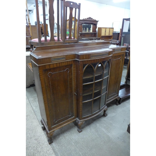 167 - A mahogany breakfront bookcase