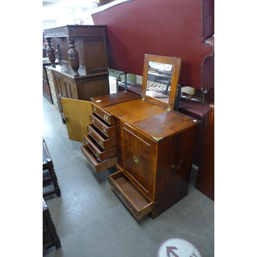 174 - A campaign style yew wood and brass mounted fitted cabinet