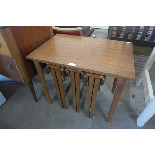 206 - A teak nest of tables, a/f