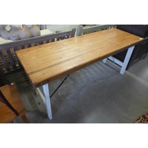 209 - A painted pine trestle table