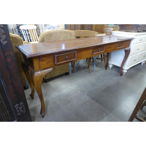 211 - A hardwood three drawer serving table