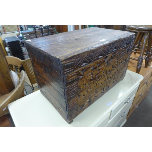 212 - A small eastern carved camphorwood box