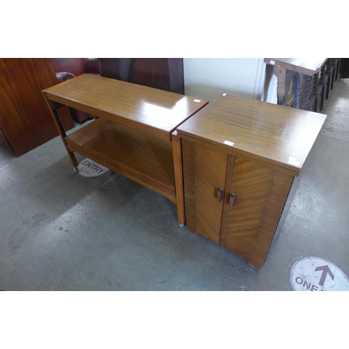 223 - A mahogany sewing cabinet and a simulated teak serving trolley