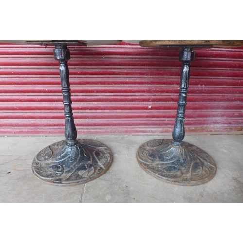 224a - A pair of cast iron and marble topped pub tables