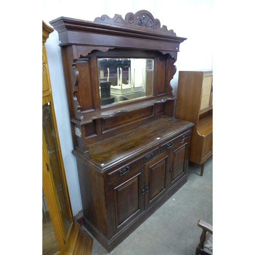 228 - A Victorian Aesthetic Movement carved oak mirror-back sideboard