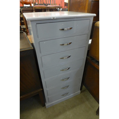 231 - A painted pine seven drawer chest