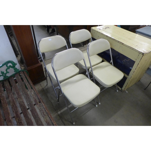 249 - A set of four chrome folding chairs