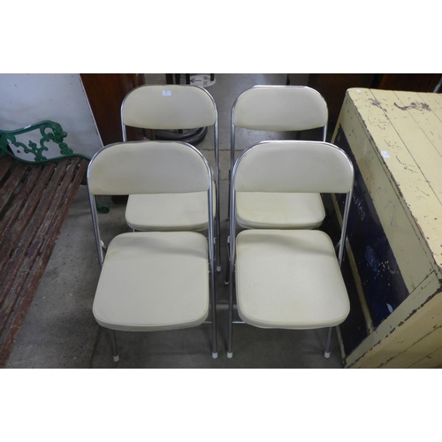 249 - A set of four chrome folding chairs