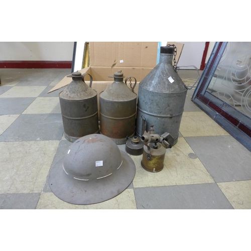 259 - Assorted metalware including a military helmet