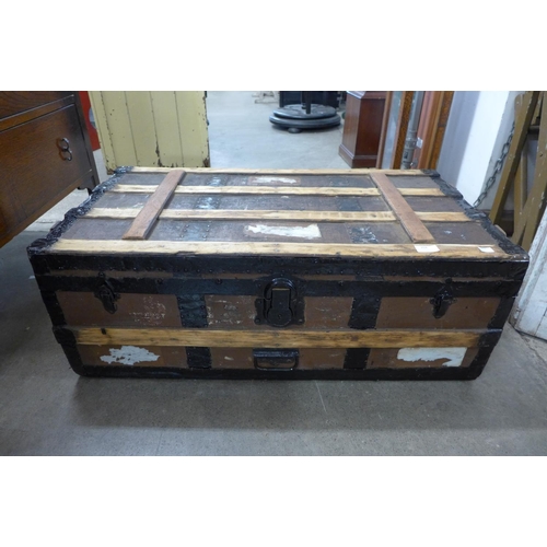 264 - A wooden steamer trunk