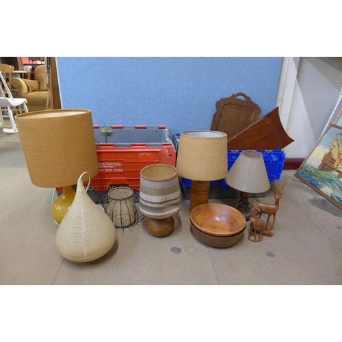 265 - A box of assorted 1960's table lamps and shades, assorted teak table lamps, carved animal figures an... 