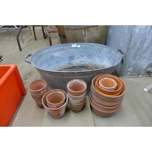 274 - A galvanised tub and terracotta plant pots