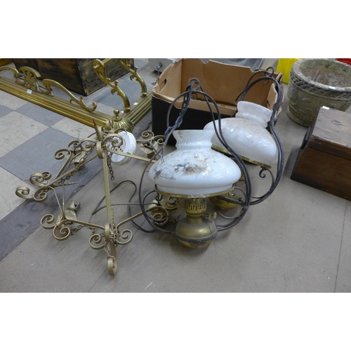 278 - A gilt wrought iron chandelier and a pair of wrought iron ceiling lights with opaque glass shades