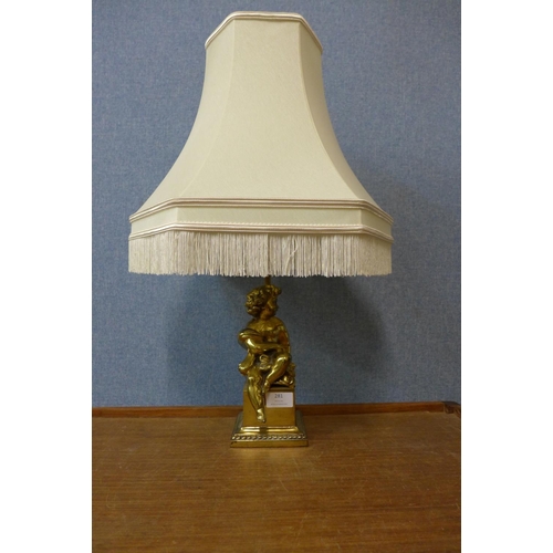 281 - A gilt metal figural cherub table lamp