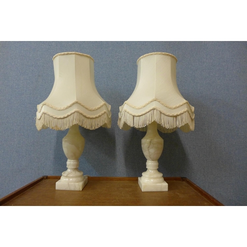 282 - A pair of marble table lamps