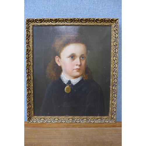 285 - English School (late 19th/20th Century), half portrait of a young girl, oil on canvas, framed