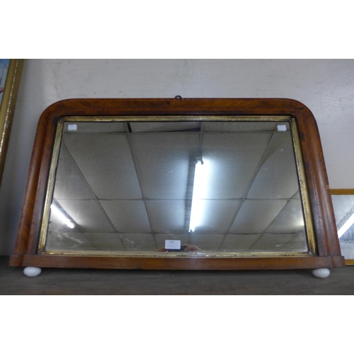 310 - A Victorian walnut overmantel mirror