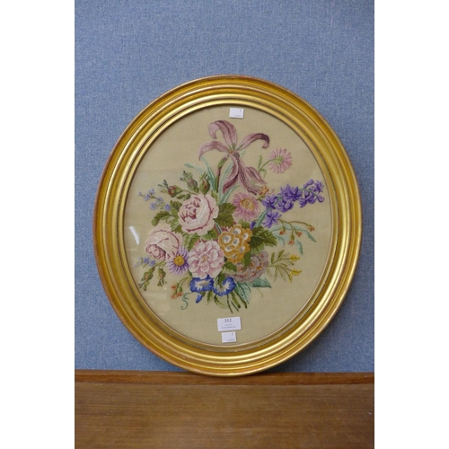 312 - A gilt framed oval needlework tapestry