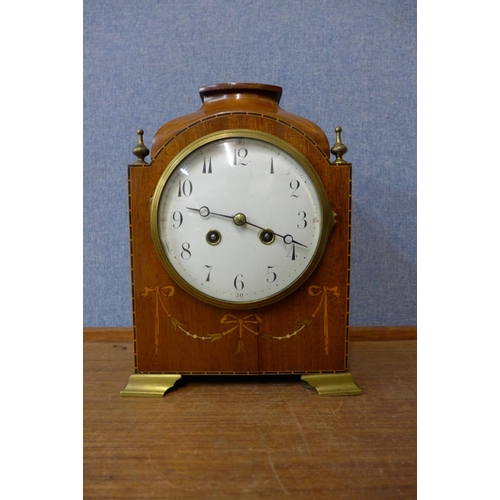 318 - An early 20th Century inlaid mahogany mantel clock