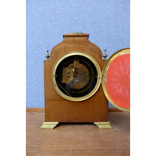 318 - An early 20th Century inlaid mahogany mantel clock