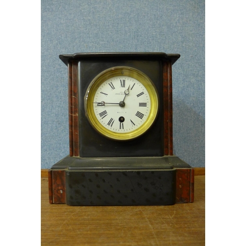 320 - A 19th Century French Belge noir mantel clock