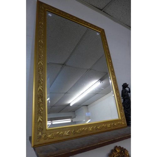 325 - A gilt framed bevelled mirror