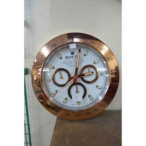 330 - A Rolex style circular wall clock