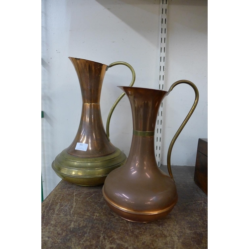 332 - A copper and brass jug and another copper jug