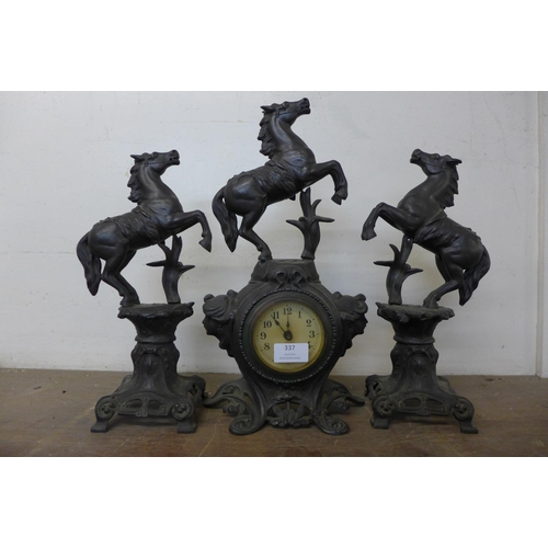 337 - A French Art Nouveau spelter clock garniture