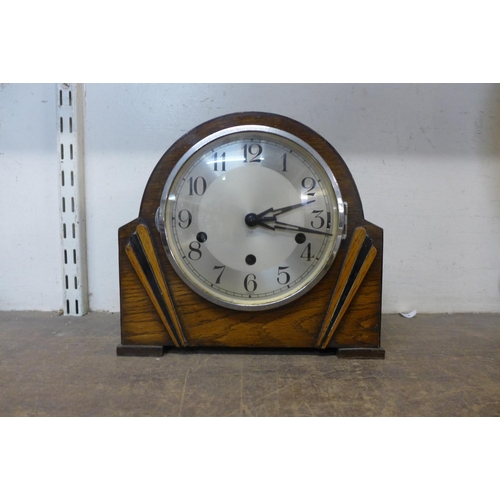 341 - An Art Deco oak mantel clock