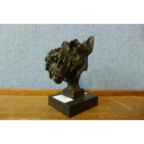 346 - A small bronze Scottish terrier bust, on black marble socle