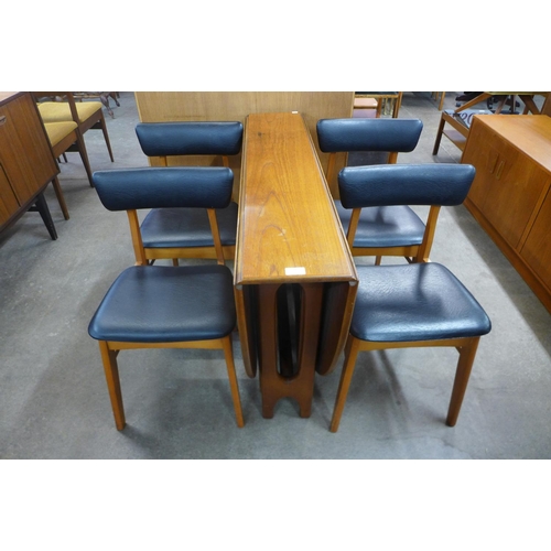 93 - A teak drop-leaf table and four chairs