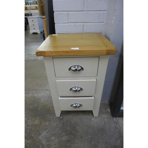 1519 - A Hampshire painted oak small three drawer bedside table * this lot is subject to VAT